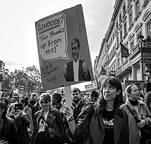 Protestor holding a sign