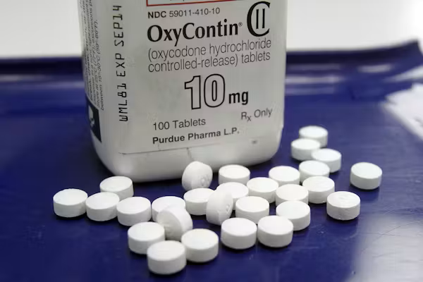 Oxycontin bottle and tablets